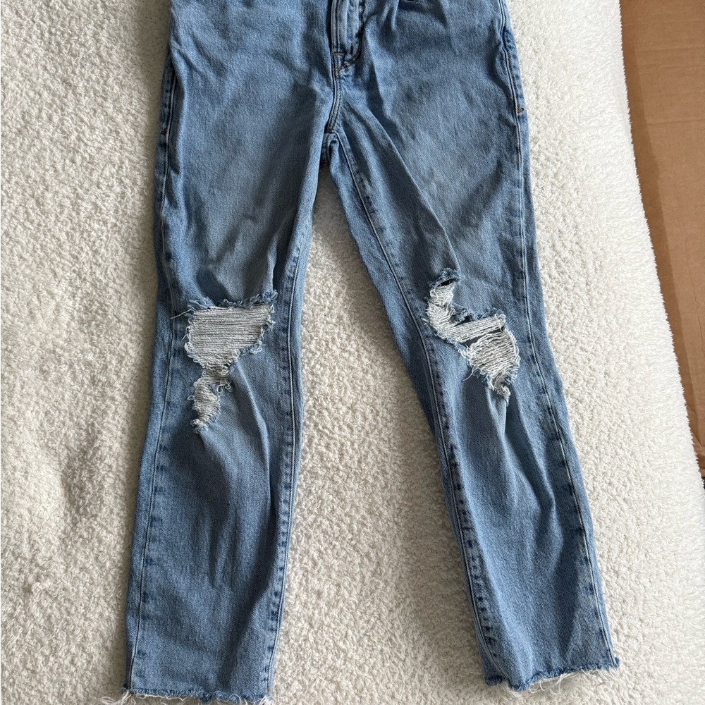 Distressed Light Blue Denim Jeans